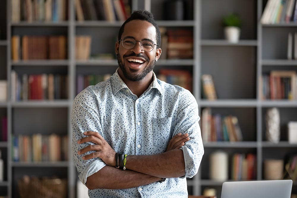 Cheerful confident handsome african american young adult